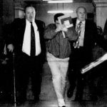 article image - John Dino Martin Photo OR Jan 29 1998 with Federal marshals at couthouse